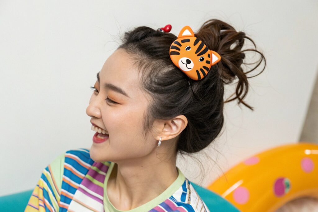Playful Portrait of Chinese Woman Wearing a Tiger Hair Clip – Fumao Accessories