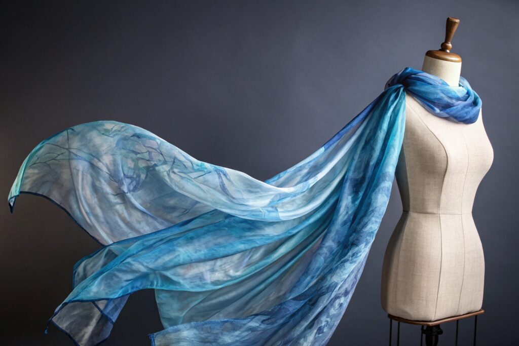 High Fashion Studio Shot of Flowing Blue Silk Scarf on Mannequin