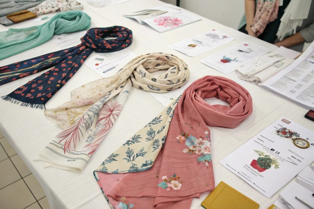 Overhead View of Assorted Scarf Styles on Display Table