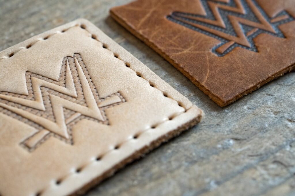 Macro Comparison of Genuine WWE Leather vs. Replica Patch