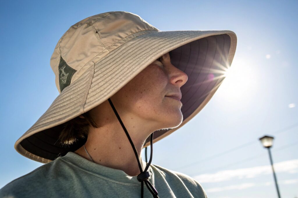 A person wearing a wide-brimmed hat