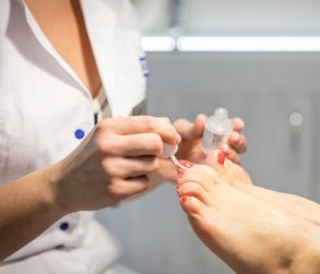 cropped-view-of-woman-getting-a-pedicure-at-beauty-PK8EVY5-1.jpg